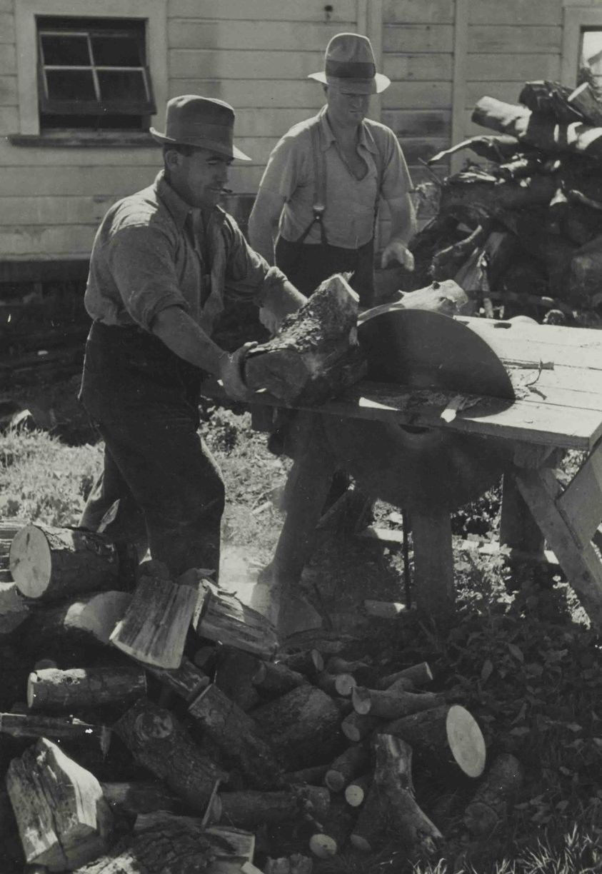 MAKING FIREWOOD - A COUPLE OF CHB FARMERS IN THE '40s CUTTING THE WINTER WOOD.