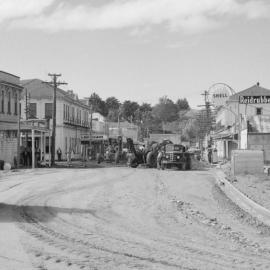 NO ORANGE CONES - WAIPAWA IN 1958 - ENABLING TRAFFIC ACCESS TO THE NEW BRIDGE - IT'S ALL A-GO ON HIGH STREET.